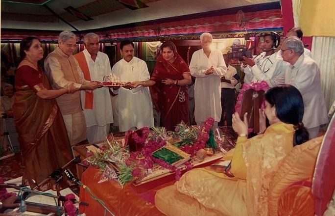Present as a revered sant is felicitated during a satsang