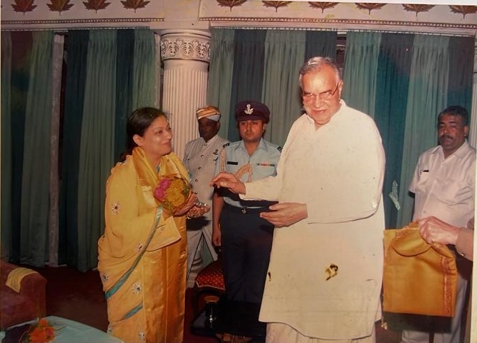 Offering a bouquet to the Governor at Raj Bhavan