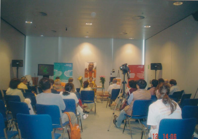 Addressing a gathering at a satsang held abroad